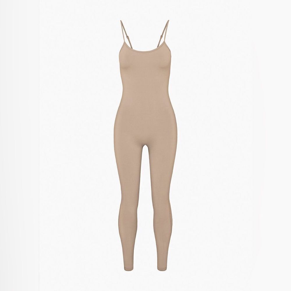 TnAction TnaBUTTER™ | Rhythm Lella
Scoop-neck jumpsuit